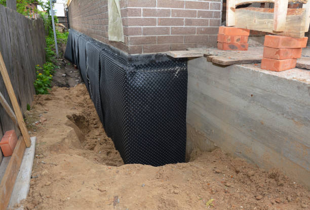 Happy homeowners after waterproofing job in Perkasie